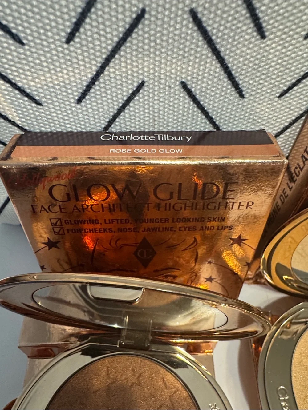 Charlotte Tilbury Glow Glide Compact Highlighters Trio- retail is $50 each